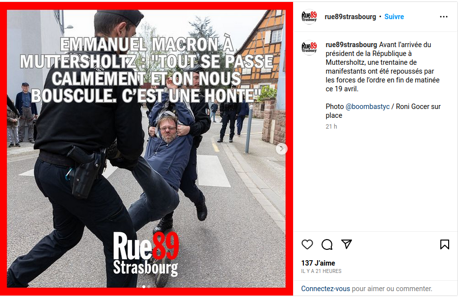 Manifestant grimaçant porté par deux gendarmes 2023-04-19-rue89strasbourg